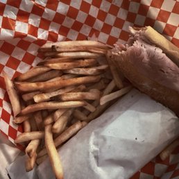 Burnt rock hard fries. That's not potato skin at the tips, that's actually singed fries.