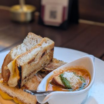 TOWN - Grilled cheese with a baby tomato soup for dipping. Part of the happy hour menu! - Steakhouses Near Me - San Carlos, California TOWN - Grilled cheese with a baby tomato soup for dipping. Part of the happy hour menu! - Steakhouses Near Me - San Carlos, California