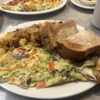 East Gate Luncheonette - Veggie omelette wheat toast with butter home fries very good. They use three eggs per omelette so it was very fulfilling. - Breakfast & Brunch Near Me - Waterbury, Connecticut East Gate Luncheonette - Veggie omelette wheat toast with butter home fries very good. They use three eggs per omelette so it was very fulfilling. - Breakfast & Brunch Near Me - Waterbury, Connecticut