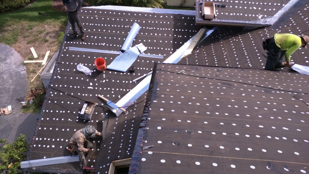 Slide of Riggs Roofing