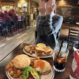 Buffalo crispy chicken sandwich, crispy tater tots as ordered, bacon grilled cheese and pretzel bites. Buffalo crispy chicken sandwich, crispy tater tots as ordered, bacon grilled cheese and pretzel bites.