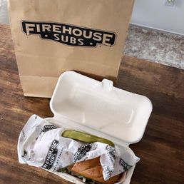 a sandwich in a styrofoam container a sandwich in a styrofoam container
