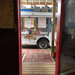 Taqueria Fast - Food Truck - There is a food truck in the back