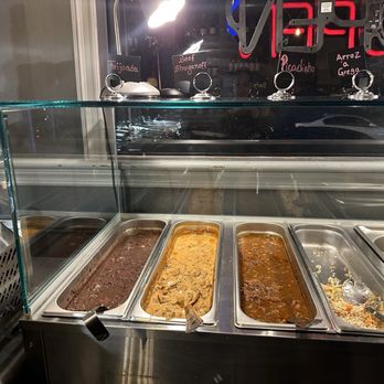 Samba Bbq - Salad bar was great and included carnitas, feijoada, bolinhos de arroz, pão de queijo, and beef stroganoff. - Brazilian Near Me - New York, New York