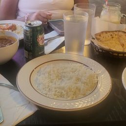 Rice, garlic cheese naan, chicken curry, chicken naan, complimentary water, ginger ale, mango lassi Rice, garlic cheese naan, chicken curry, chicken naan, complimentary water, ginger ale, mango lassi