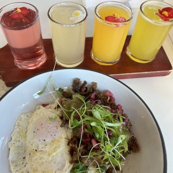 Dish Society - Brisket N' Eggs Fancy-mosa Flight - prickly pear, grapefruit, orange, pineapple - Breakfast & Brunch Near Me - Houston, Texas Dish Society - Brisket N' Eggs Fancy-mosa Flight - prickly pear, grapefruit, orange, pineapple - Breakfast & Brunch Near Me - Houston, Texas