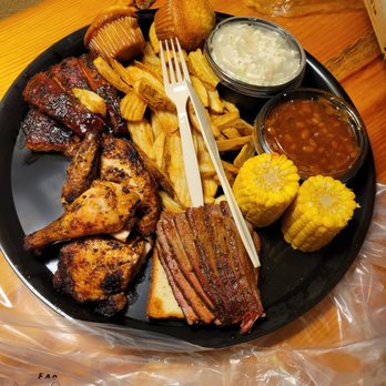 Famous Dave's Bar-B-Que - Feast for 2, fork for scale. - Barbeque Near Me - Kansas City, Kansas