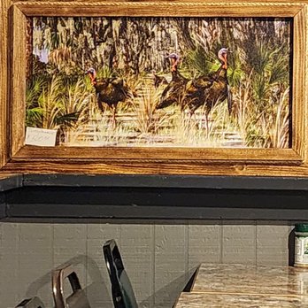 The Gator Shack - a table and chairs - Seafood Near Me - Sebring, Florida
