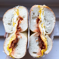 Brook Street Hot Bagels & Deli - Bacon egg cheese on plain bagel with salt pepper ketchup