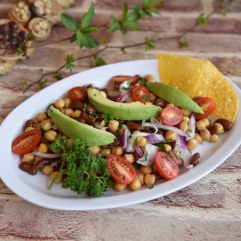 Yummy Tacos - Fresh avocado bean salad with cherry tomatoes, chickpeas & citrus--healthy, flavorful, and perfect for a light bite at Yummy Tacos! - Tacos Near Me - Williston Park, New York Yummy Tacos - Fresh avocado bean salad with cherry tomatoes, chickpeas & citrus--healthy, flavorful, and perfect for a light bite at Yummy Tacos! - Tacos Near Me - Williston Park, New York