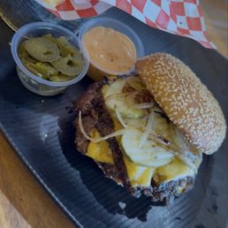 Smash burger with fries and Jalapeños with thousand island Smash burger with fries and Jalapeños with thousand island