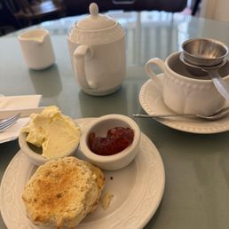 Scone with clotted cream and jam Scone with clotted cream and jam