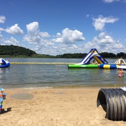 The beach. Sectioned off area of the lake for swimming with a bunch of anchored rafts/slides/trampoline/etc out there. The beach. Sectioned off area of the lake for swimming with a bunch of anchored rafts/slides/trampoline/etc out there.