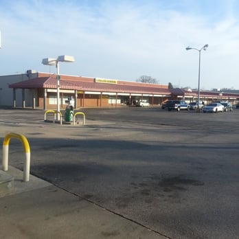 Dollar General - a parking lot with a gas station in the background - Grocery Near Me - Pasadena, Maryland