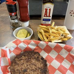 Daddio's Burger - Single patty with seasoned fries and a side of pickles - Delicious !!! Used A-1 !!!
