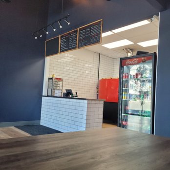 Doughfellas Pizza - a view of the counter area - Pizza Near Me - Calgary, Alberta Doughfellas Pizza - a view of the counter area - Pizza Near Me - Calgary, Alberta