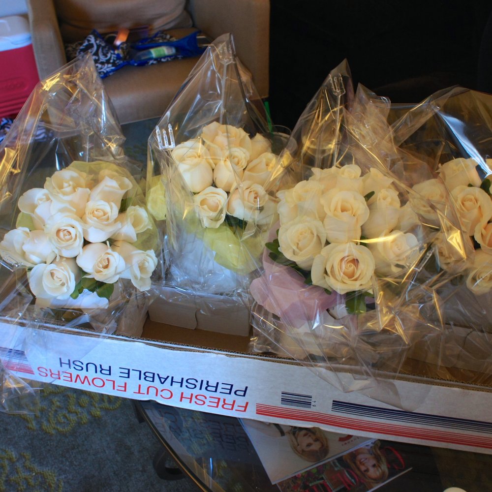 Great Falls Florist - Bridesmaids Bouquets: 12 Ivory Amelia roses and green pitt, wrapped with ivory satin ribbon and pearl pins ($85 each) - Florists Near Me - Great Falls, Virginia