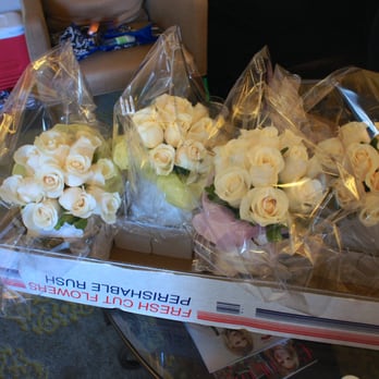 Great Falls Florist - Bridesmaids Bouquets: 12 Ivory Amelia roses and green pitt, wrapped with ivory satin ribbon and pearl pins ($85 each) - Florists Near Me - Great Falls, Virginia