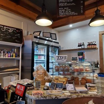 Mason And Main - a counter with a variety of food items - Candy Stores Near Me - Franklinton, North Carolina