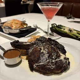 Not sure what my friend ordered but it was a huge steak that was cooked just right Not sure what my friend ordered but it was a huge steak that was cooked just right