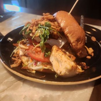 Reunion Kitchen + Drink - Blackened halibut, a little dry for the fish, but sauce on bun helps. Coleslaw is thai dressing- very good. - New American Near Me - Brea, California
