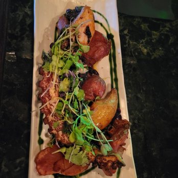 Panela - Octopus with fried potatoes - Latin American Near Me - Hoboken, New Jersey Panela - Octopus with fried potatoes - Latin American Near Me - Hoboken, New Jersey
