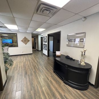 Nesco - Walking down the hall - Used Car Dealers Near Me - Arlington, Texas