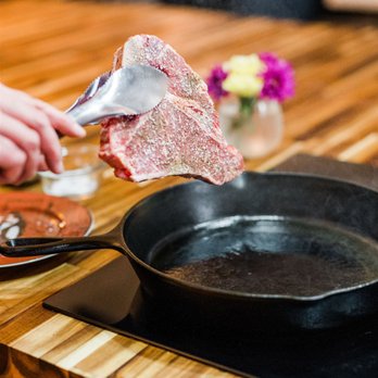 The Travelling Cafe - a steak being cooked in a skillet - Cooking Classes Near Me - Pittsboro, North Carolina The Travelling Cafe - a steak being cooked in a skillet - Cooking Classes Near Me - Pittsboro, North Carolina
