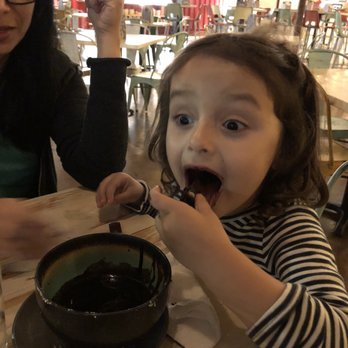 SouthBound - Our daughter enjoying churros dipped in chocolate sauce! - Tex-Mex Near Me - Charlotte, North Carolina