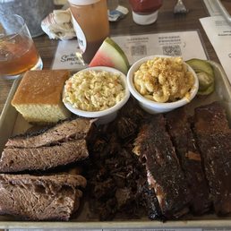 Brisket, burnt ends, ribs, coleslaw, cornbread, mac and cheese. Brisket, burnt ends, ribs, coleslaw, cornbread, mac and cheese.