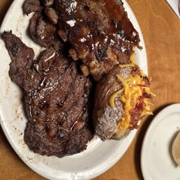 12 oz ribeye w/ribs and loaded baked potato