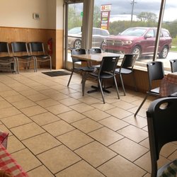 Small dining area 3 tables for 4 total of 12 seats for dining in.