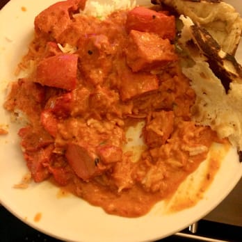 Daawat Grill - Butter masala chicken, rice, and garlic naan. - Indian Near Me - Seattle, Washington Daawat Grill - Butter masala chicken, rice, and garlic naan. - Indian Near Me - Seattle, Washington