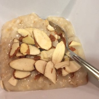 H Bar - a bowl of oatmeal with almonds - Cocktail Bars Near Me - Bellevue, Washington H Bar - a bowl of oatmeal with almonds - Cocktail Bars Near Me - Bellevue, Washington
