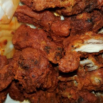 Halal Pizza - a pile of fried chicken - Pizza Near Me - Detroit, Michigan