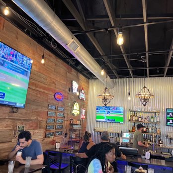 Bovine Burgers - people sitting at the bar watching tvs - Burgers Near Me - Jamesburg, New Jersey Bovine Burgers - people sitting at the bar watching tvs - Burgers Near Me - Jamesburg, New Jersey