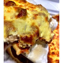 Late Night Stop for Good Cheese & Sausage Pizza by Slice 4$ @Villa Palermo Pizza .2154 W Devon Ave, Chicago, IL Open to Midnight. Cool!