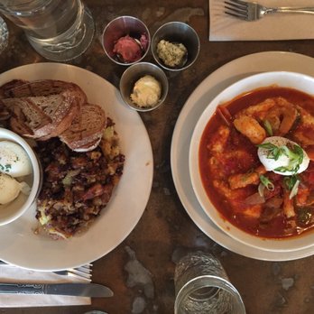 Sweet Chick - 2 poached eggs with toast and home fries (left) Shrimp and grits (right) - Southern Near Me - New York, New York Sweet Chick - 2 poached eggs with toast and home fries (left) Shrimp and grits (right) - Southern Near Me - New York, New York