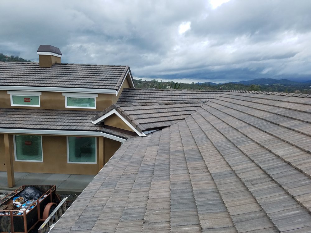 Slide of Trinity Roofing