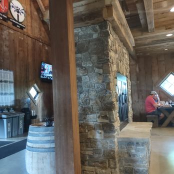 22 Northmen Brewing Company - stone fireplace in the center of the tap room - Breweries Near Me - Alexandria, Minnesota 22 Northmen Brewing Company - stone fireplace in the center of the tap room - Breweries Near Me - Alexandria, Minnesota