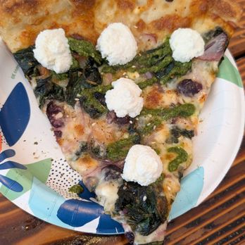 Speak Cheezy - Bloomsdale Slice (white sauce base with a pesto drizzle) - Pizza Near Me - Long Beach, California Speak Cheezy - Bloomsdale Slice (white sauce base with a pesto drizzle) - Pizza Near Me - Long Beach, California