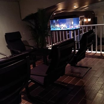 Eclipse Hookah Lounge - a flat screen tv in the living room - Hookah Bars Near Me - Philadelphia, Pennsylvania Eclipse Hookah Lounge - a flat screen tv in the living room - Hookah Bars Near Me - Philadelphia, Pennsylvania