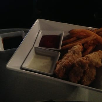 Studio Movie Grill - Coconut Chicken Tenders (BBQ sauce on the left, ketchup & ranch inside the bowl) - Cinema Near Me - Duluth, Georgia Studio Movie Grill - Coconut Chicken Tenders (BBQ sauce on the left, ketchup & ranch inside the bowl) - Cinema Near Me - Duluth, Georgia