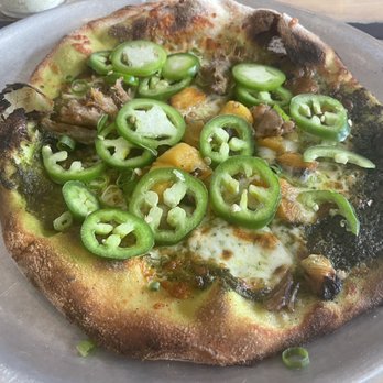 Monkeypod Kitchen - Kalua Pork & Pineapple pizza... honestly somewhat of a joke. Mini piece of pork - New American Near Me - Lahaina, Hawaii