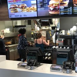 a man and a woman ordering food a man and a woman ordering food