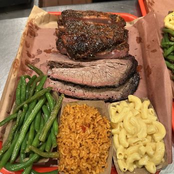 Terry Black's Barbecue - We got 1-lb pork ribs (4 stars, very salty) and 1/2-lb brisket (5 stars). Beans and mac are 5 stars, but rice too salty (3 stars) - Barbeque Near Me - Austin, Texas Terry Black's Barbecue - We got 1-lb pork ribs (4 stars, very salty) and 1/2-lb brisket (5 stars). Beans and mac are 5 stars, but rice too salty (3 stars) - Barbeque Near Me - Austin, Texas