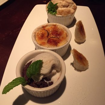 Yard House - Mini trio sampler (peach apple cobbler, crème brûlée and chocolate soufflé cake). Dinner 1/20/2017 - Bars Near Me - Long Beach, California