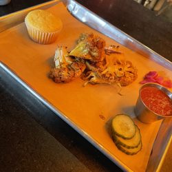 proof - moroccan cauliflower steak, cornbread muffin, cucumbers, onions, proof sauce