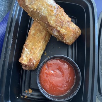 Three Monkeys Cafe - Cheesesteak rolls! And spicy ketchup!... which is the real star! - New American Near Me - Philadelphia, Pennsylvania