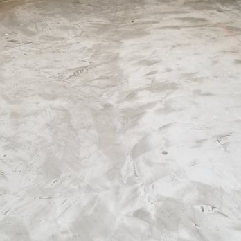 Quality Floor Covering - a concrete floor being laid - Flooring Near Me